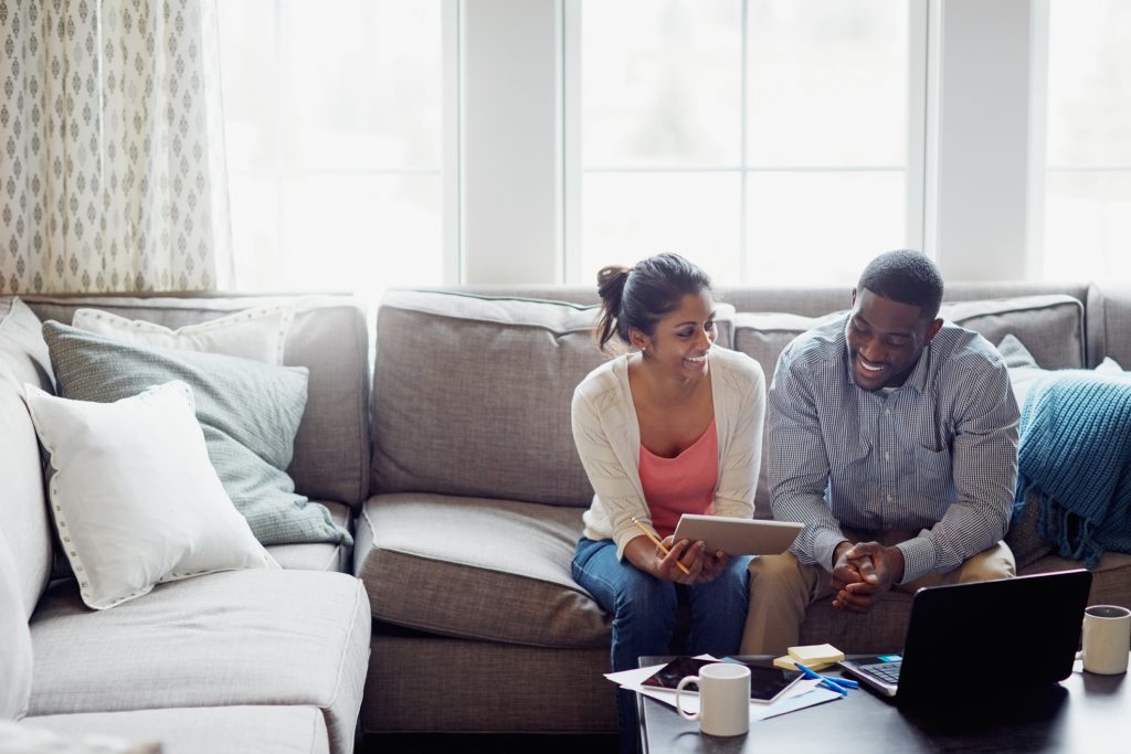 decorative photo - man and woman going over finances